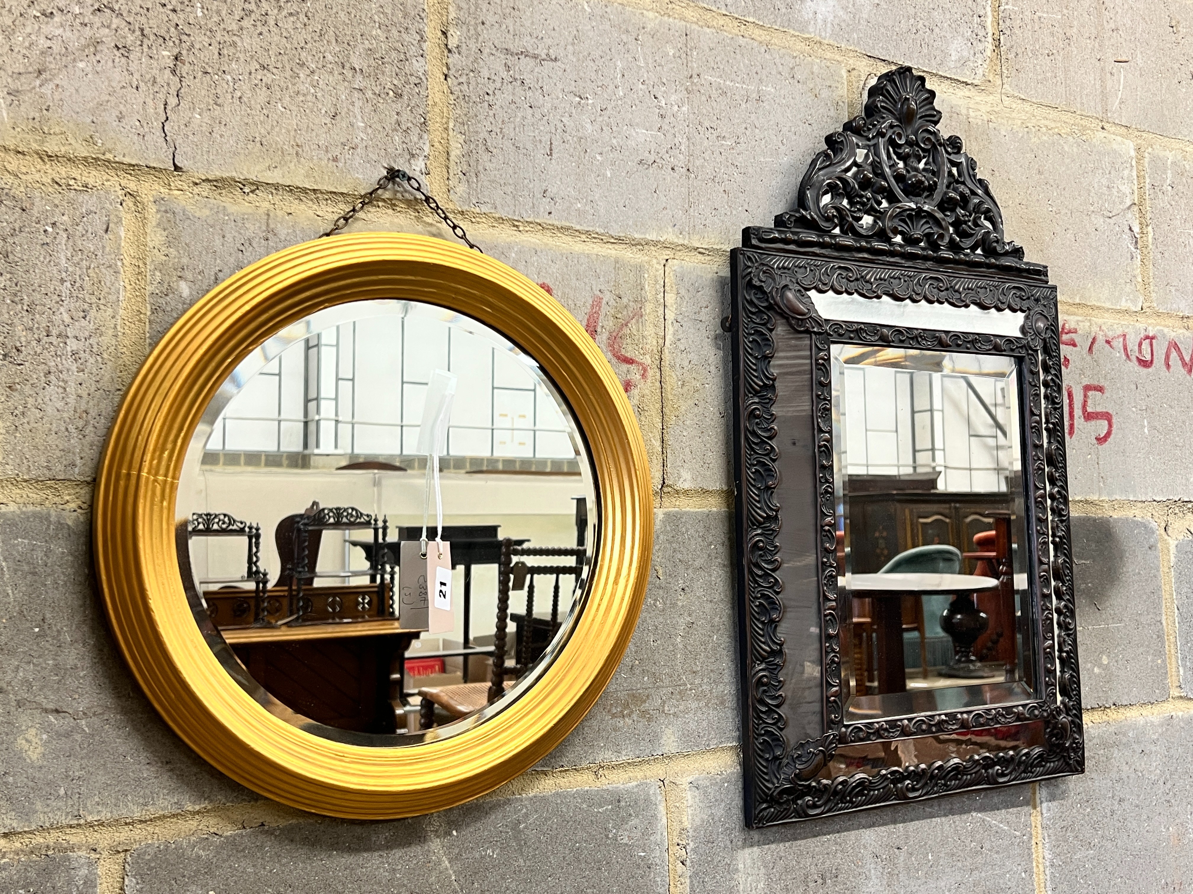 A 19th century style French embossed metal wall mirror, width 43cm, height 72cm together with a circular gilt framed wall mirror